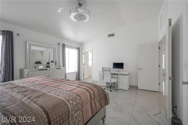 bedroom featuring vaulted ceiling