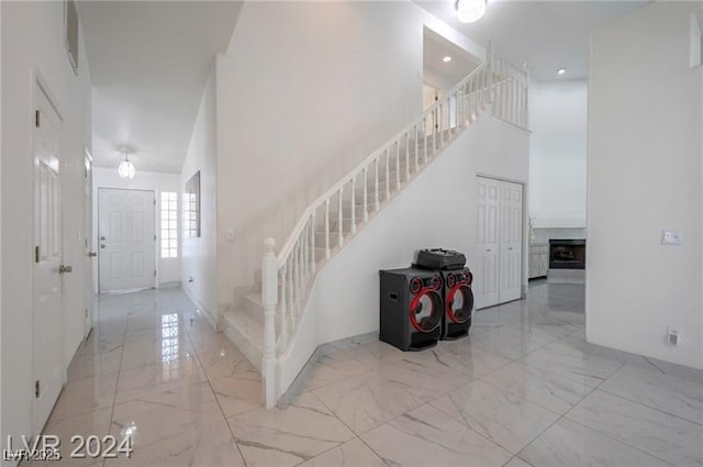 entrance foyer featuring a high ceiling