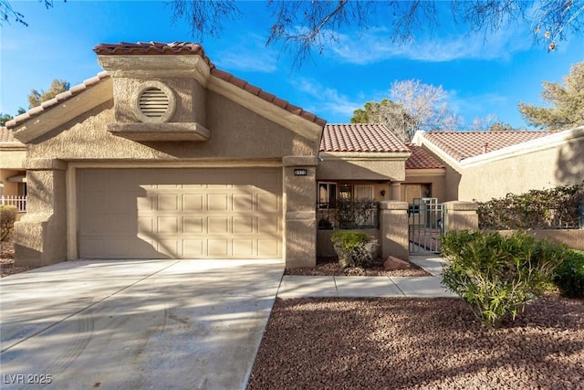 mediterranean / spanish-style home featuring a garage