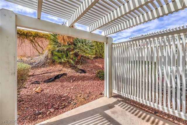 view of gate featuring a pergola