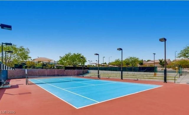 view of sport court with community basketball court and fence