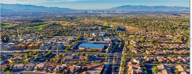 birds eye view of property featuring a residential view and a mountain view