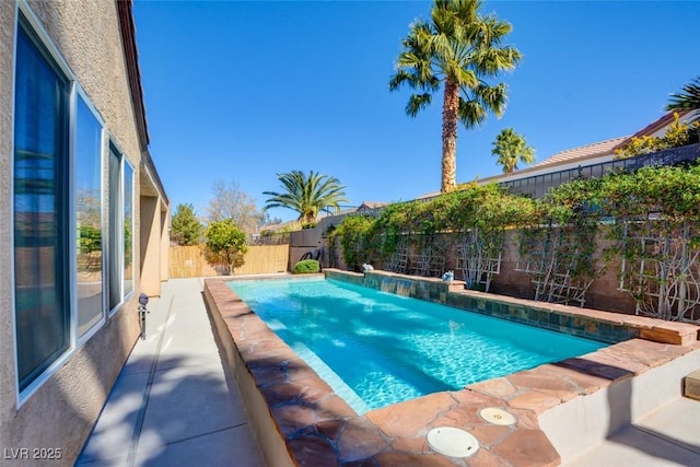 view of pool featuring a fenced backyard and a fenced in pool