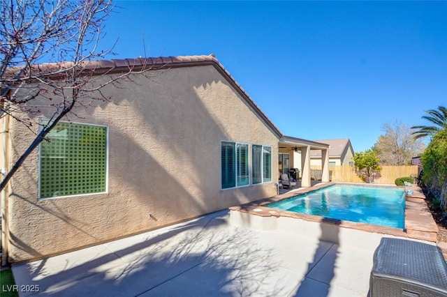 view of pool featuring a fenced in pool, fence, and a patio