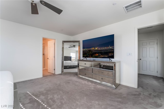 carpeted living room featuring ceiling fan