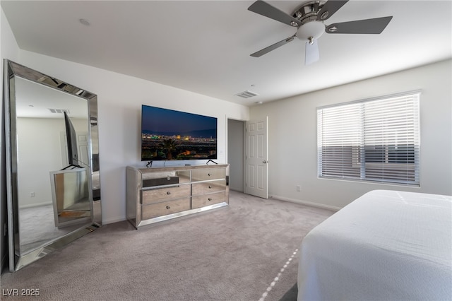 bedroom featuring ceiling fan and light colored carpet