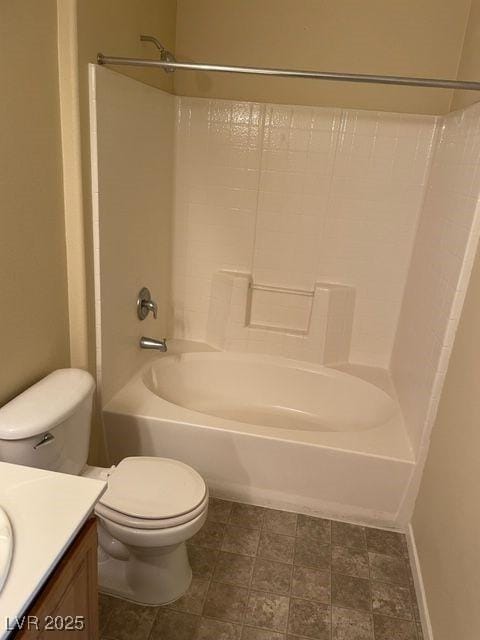 full bathroom featuring vanity, bathing tub / shower combination, and toilet