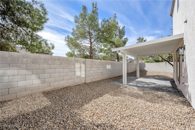 view of yard with a patio area