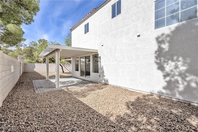 rear view of property with a patio