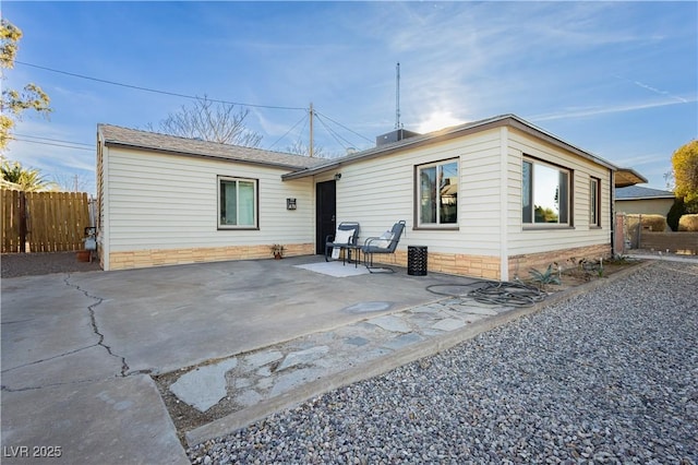 back of house featuring a patio area