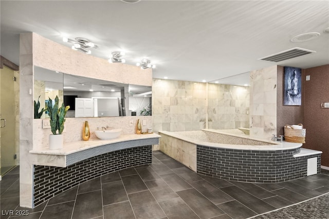 bathroom featuring separate shower and tub, tile patterned flooring, tile walls, tasteful backsplash, and vanity