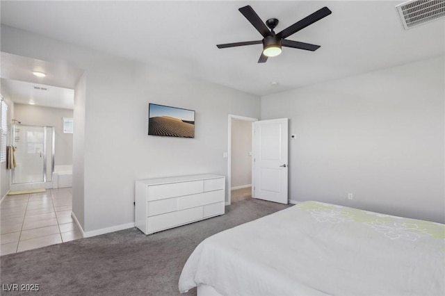 9690 Hiking Ave, Las Vegas, NV 89166 - tiled bedroom featuring carpet, visible vents, baseboards, and ensuite bathroom