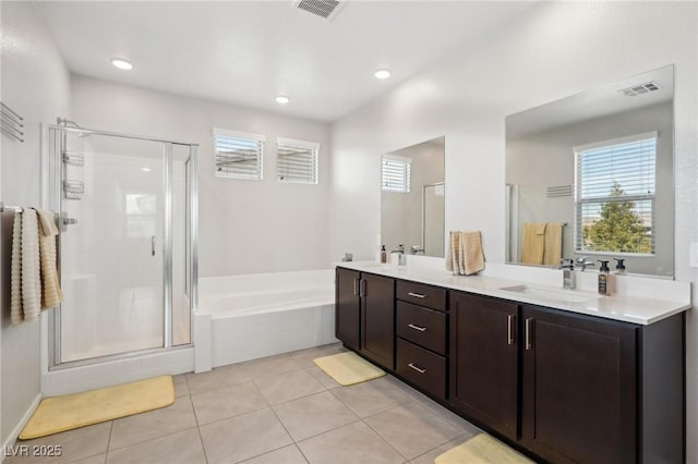 9690 Hiking Ave, Las Vegas, NV 89166 - full bath featuring a stall shower, tile patterned flooring, visible vents, and a sink