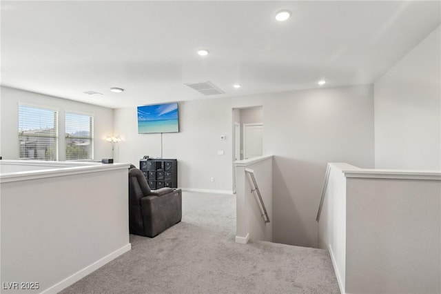 9690 Hiking Ave, Las Vegas, NV 89166 - hallway with light carpet, visible vents, baseboards, an upstairs landing, and recessed lighting