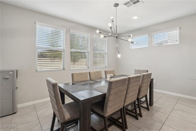 9690 Hiking Ave, Las Vegas, NV 89166 - dining room with a healthy amount of sunlight, visible vents, baseboards, and light tile patterned floors