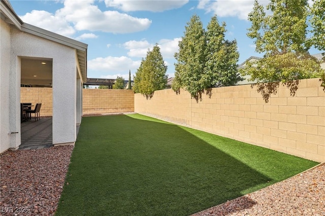 9690 Hiking Ave, Las Vegas, NV 89166 - view of yard featuring a fenced backyard