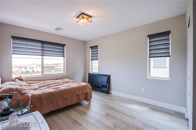 bedroom featuring light hardwood / wood-style flooring