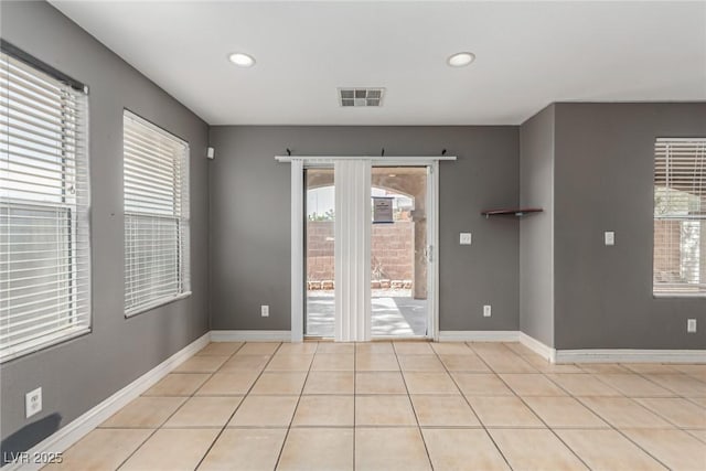 view of tiled spare room