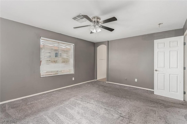 carpeted empty room with ceiling fan