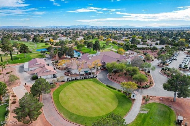 birds eye view of property featuring a mountain view and a residential view