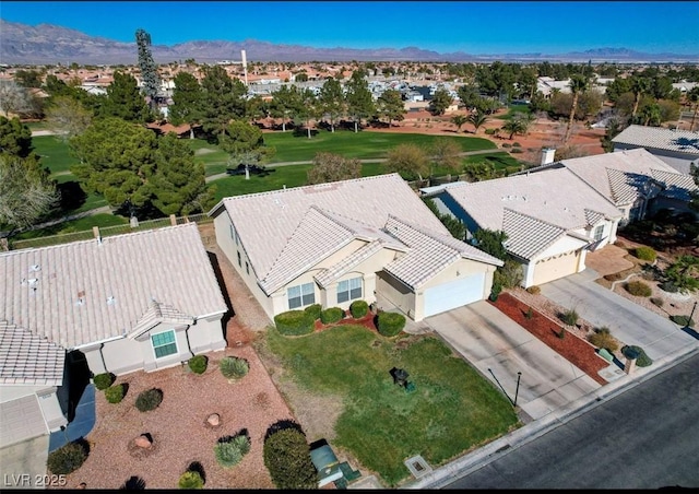 birds eye view of property with a residential view