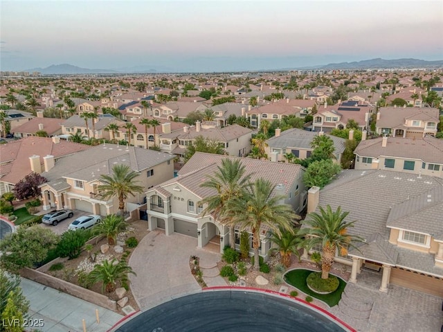 birds eye view of property with a residential view and a mountain view