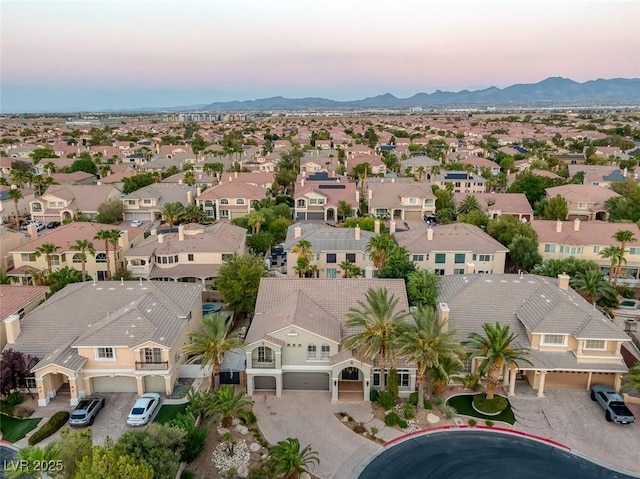 drone / aerial view with a mountain view and a residential view