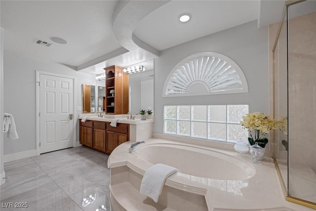 full bathroom featuring baseboards, visible vents, vanity, a shower stall, and a bath