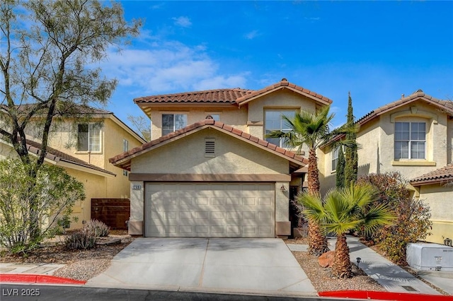 mediterranean / spanish-style house featuring a garage