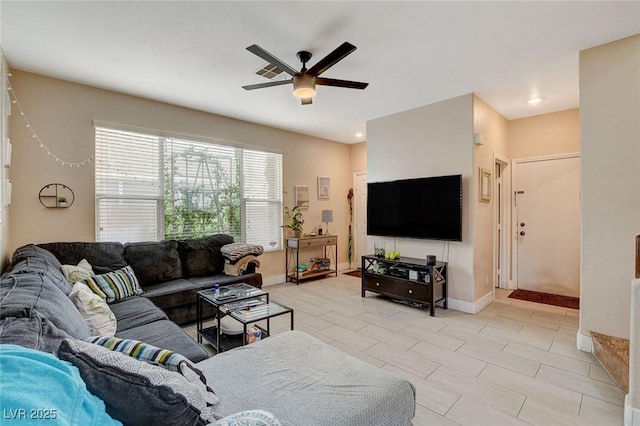 living room featuring ceiling fan