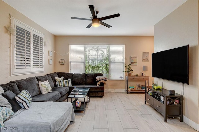 living room featuring ceiling fan