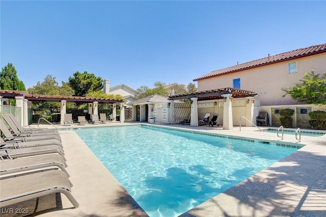 view of pool featuring a patio and a pergola