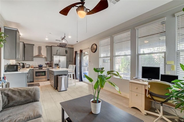 living room with ceiling fan