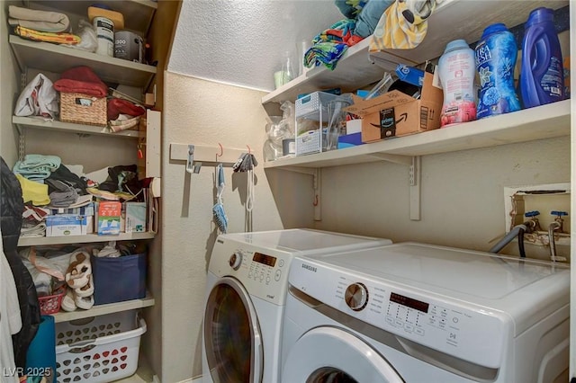 laundry room with independent washer and dryer