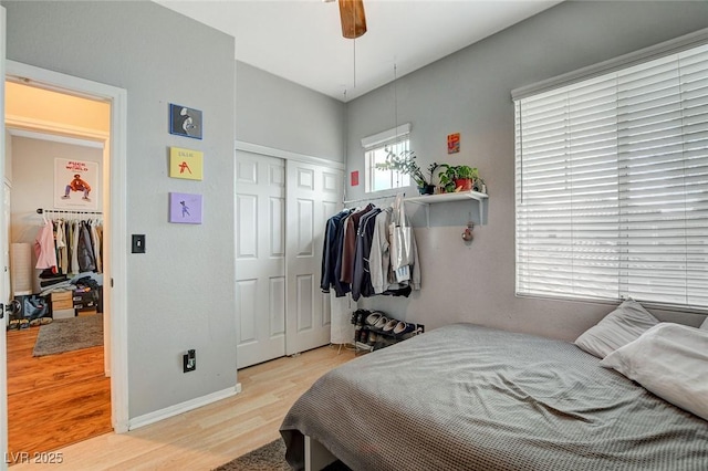 bedroom with a closet and hardwood / wood-style floors