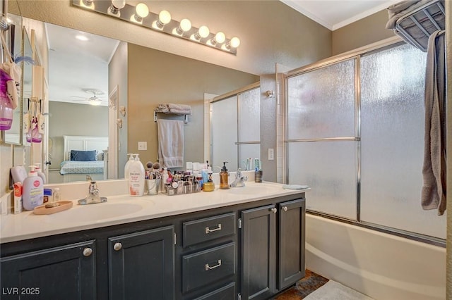 bathroom with ceiling fan, vanity, and enclosed tub / shower combo