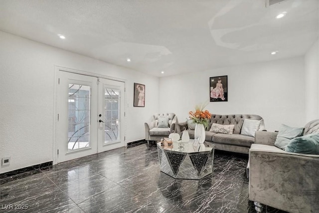 living area with baseboards, marble finish floor, french doors, and recessed lighting