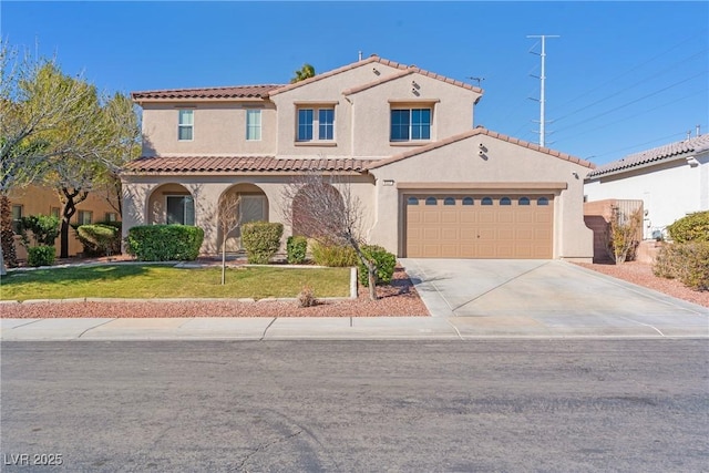 mediterranean / spanish house featuring a garage, concrete driveway, a tiled roof, stucco siding, and a front lawn