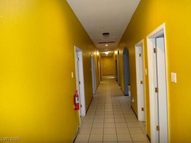 hallway with light tile patterned flooring