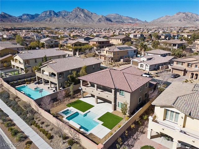 bird's eye view featuring a residential view and a mountain view