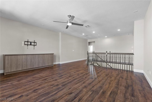 unfurnished room featuring visible vents, baseboards, a ceiling fan, dark wood-style flooring, and recessed lighting