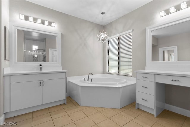 full bathroom featuring walk in shower, a garden tub, vanity, and tile patterned floors