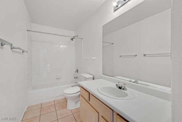 full bathroom with tile patterned floors, vanity, toilet, and tiled shower / bath