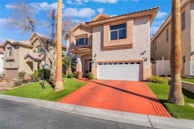 mediterranean / spanish-style home featuring a garage, a front yard, and stucco siding