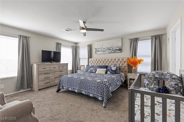 bedroom featuring ceiling fan and carpet floors