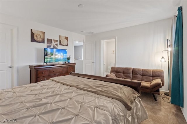 bedroom featuring light carpet