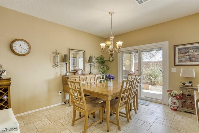 dining room with a notable chandelier