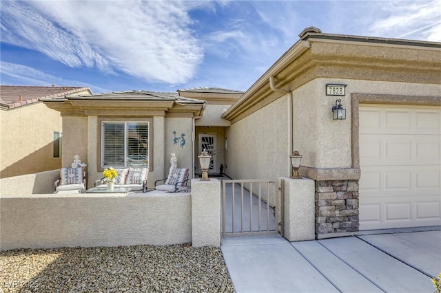 doorway to property featuring a garage