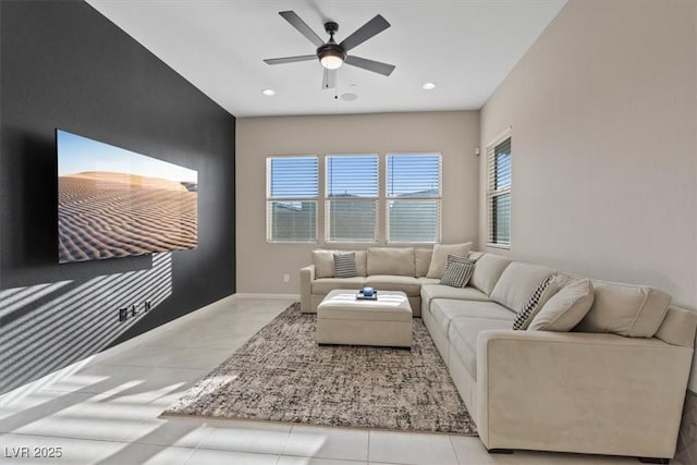 tiled living room featuring ceiling fan