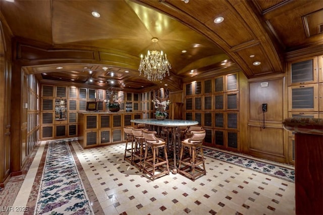 9103 Alta Dr Unit 404, Las Vegas, NV 89145 - interior space featuring an inviting chandelier, a decorative wall, crown molding, recessed lighting, and vaulted ceiling